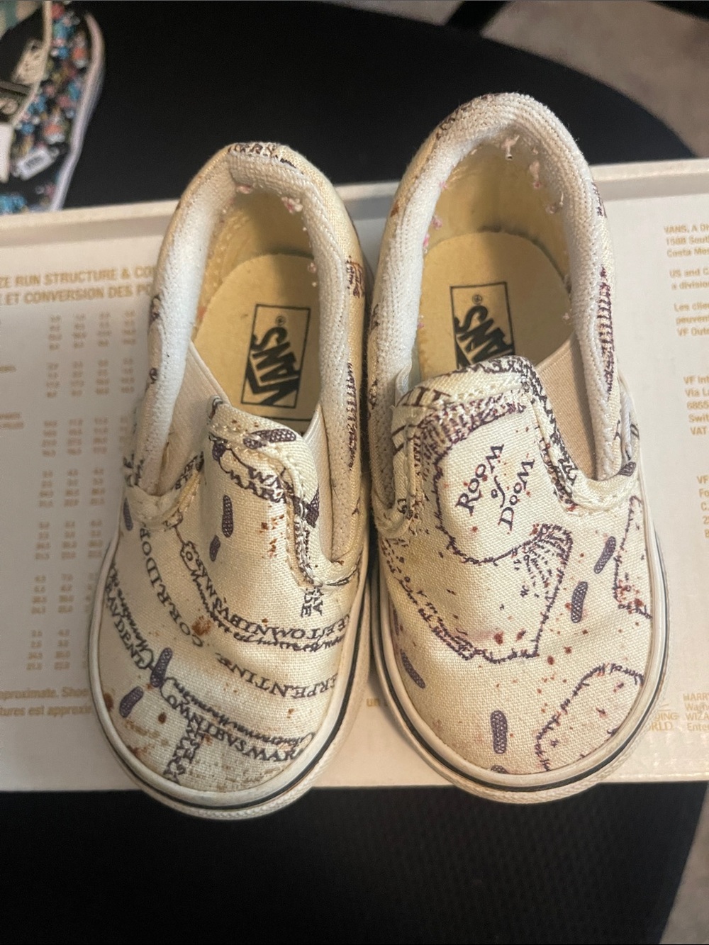 Vans Kids Slip-On Sneakers in Cream with Dark Brown Map Print